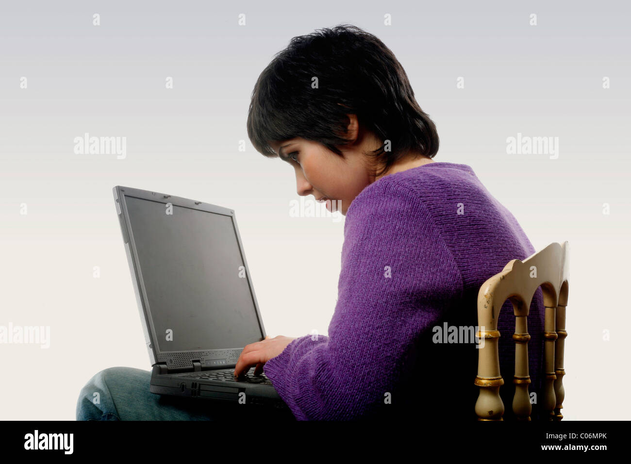 Latin girl with a laptop Stock Photo