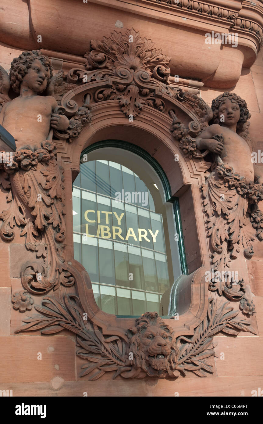 Reflection in the window of City Library,Deansgate,Manchester.Temporary ...
