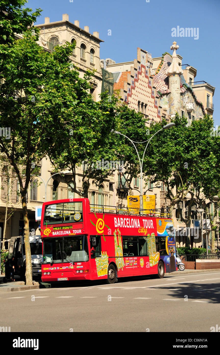 Tourist bus on Passeig de Gracia, an avenue in Barcelona, Spain, Iberian Peninsula, Europe Stock Photo