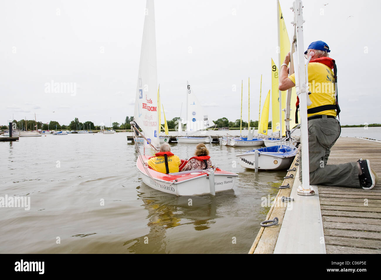 Sail dinghy, modified for disabled people, launches at Oulton Broad - courtesy of the Waveney Sailability Trust Stock Photo