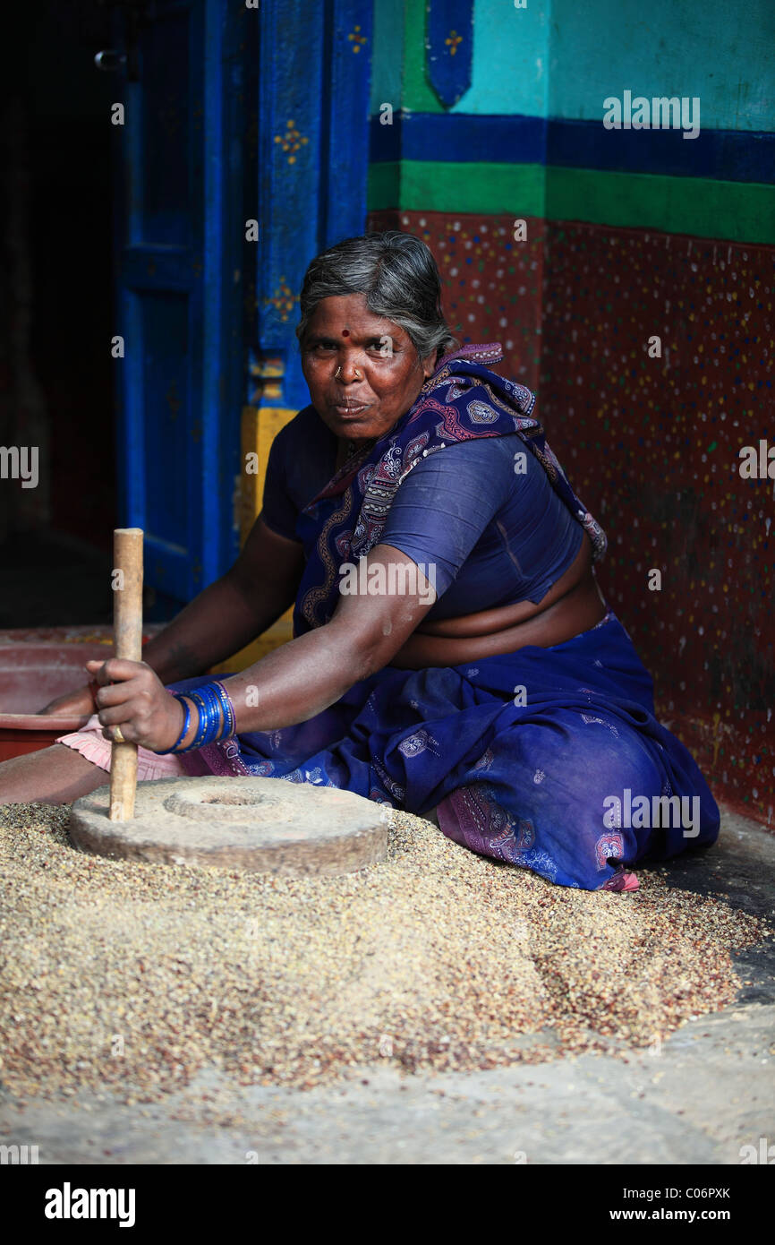 woman crushing grains Andhra Pradesh South India Stock Photo Alamy