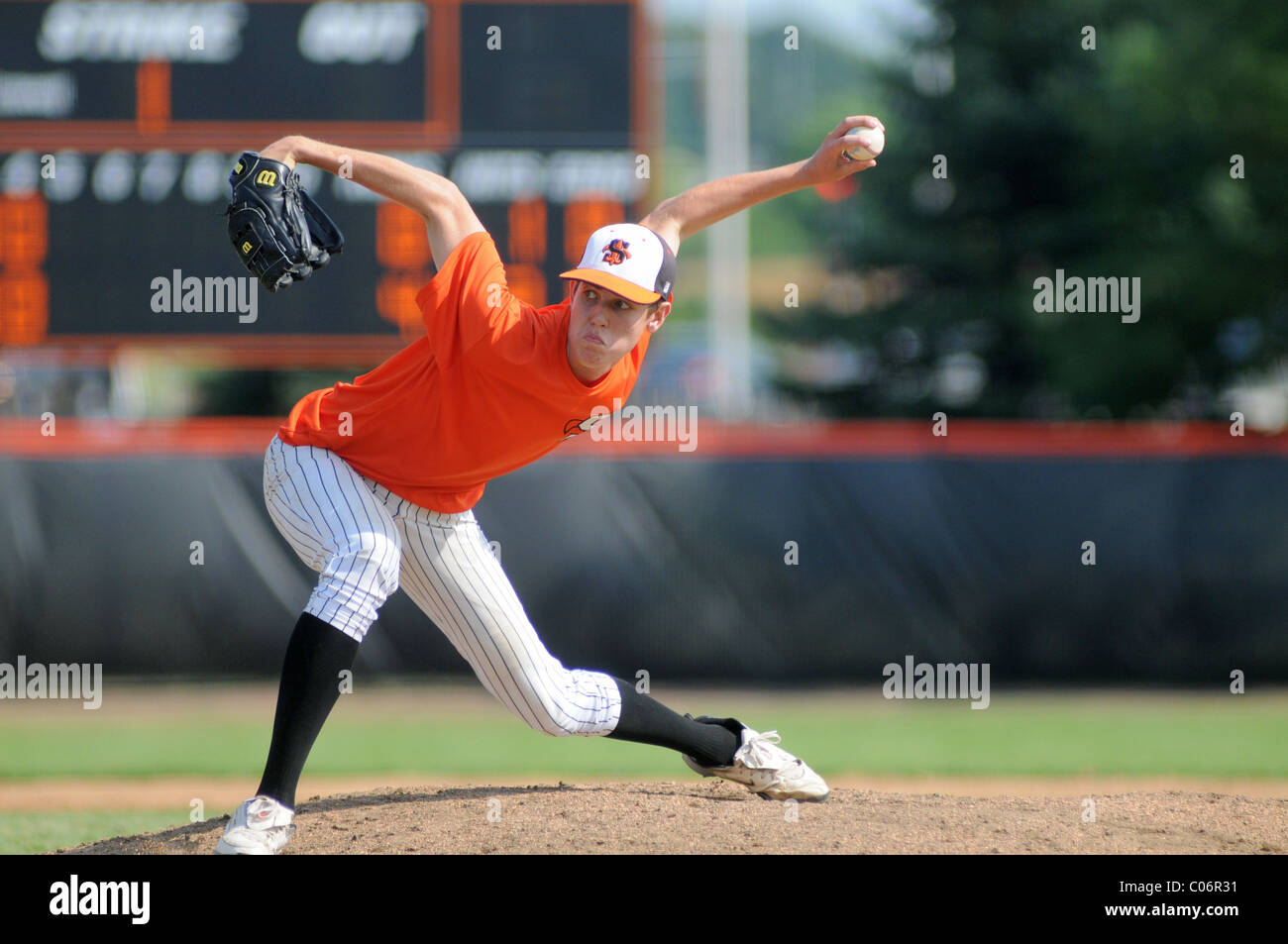 Boy pitching a ball hires stock photography and images Alamy