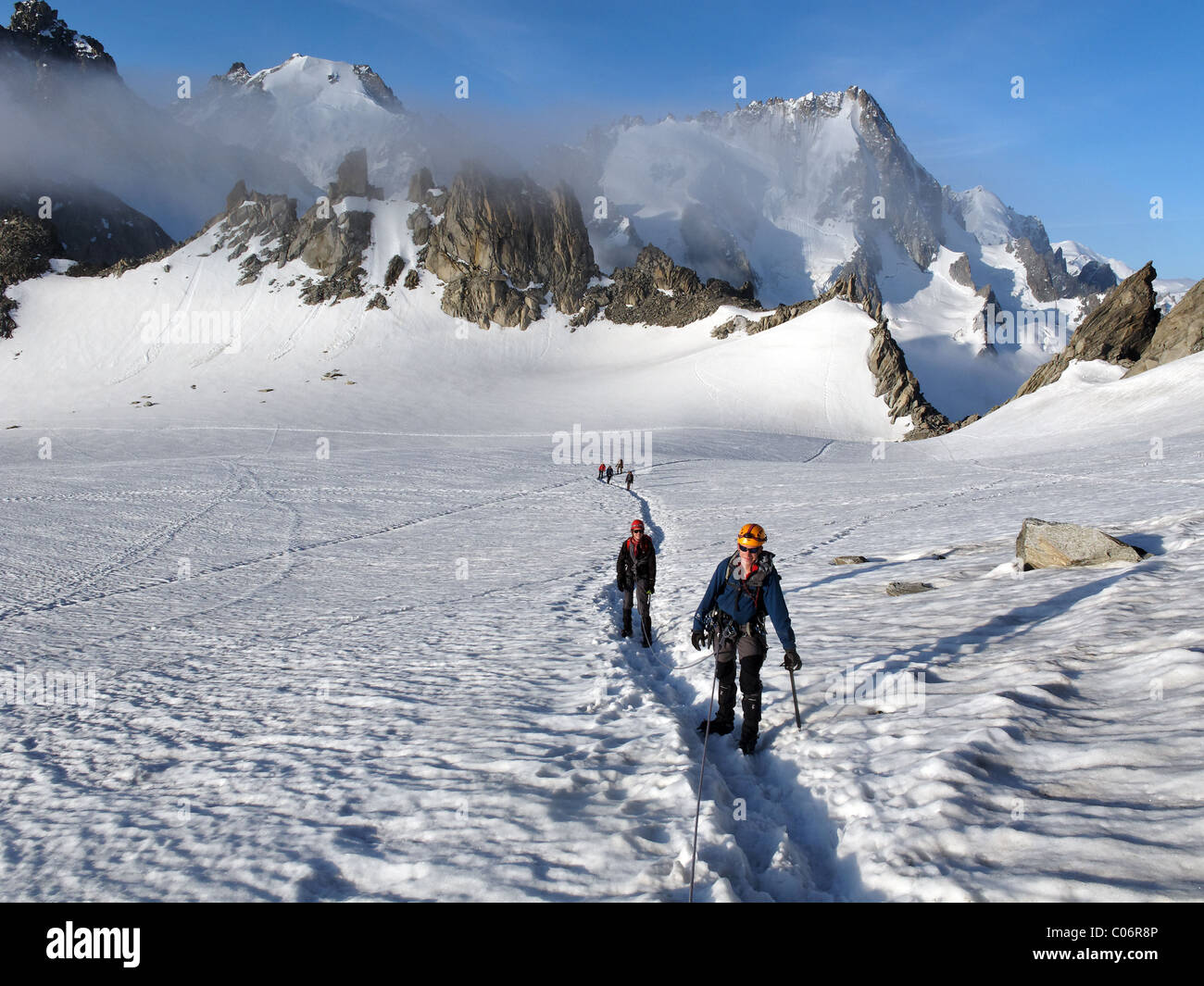 Alpine climbers on the Trient glacier approaching the Aiguille du Tour Stock Photo