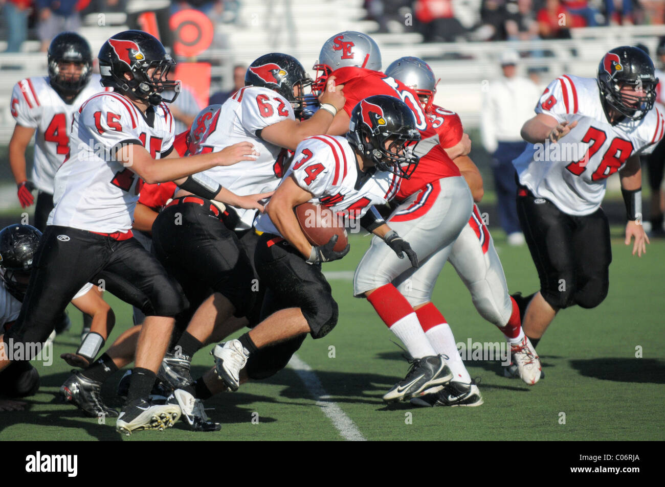 high school football game offensive lineman running back USA. Stock Photo