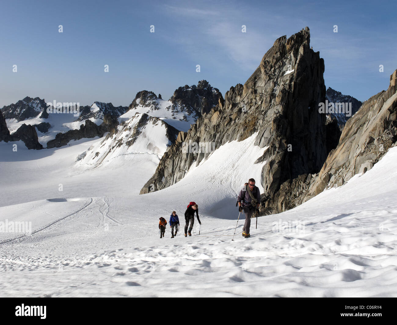 Alpine climbers on the Trient glacier approaching the Aiguille du Tour Stock Photo