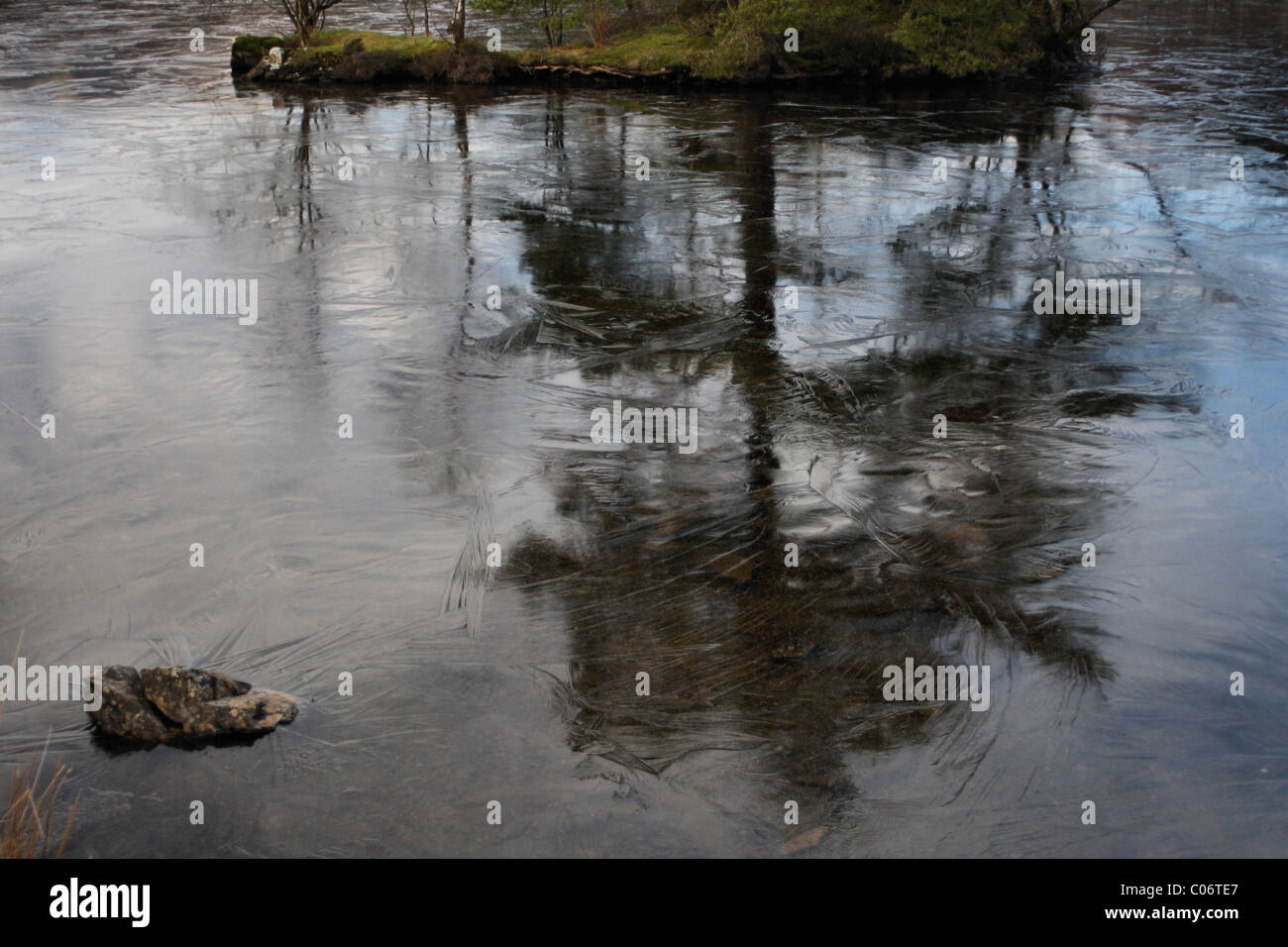 Frozen water at Tarn Hows Lake District Cumbria Stock Photo