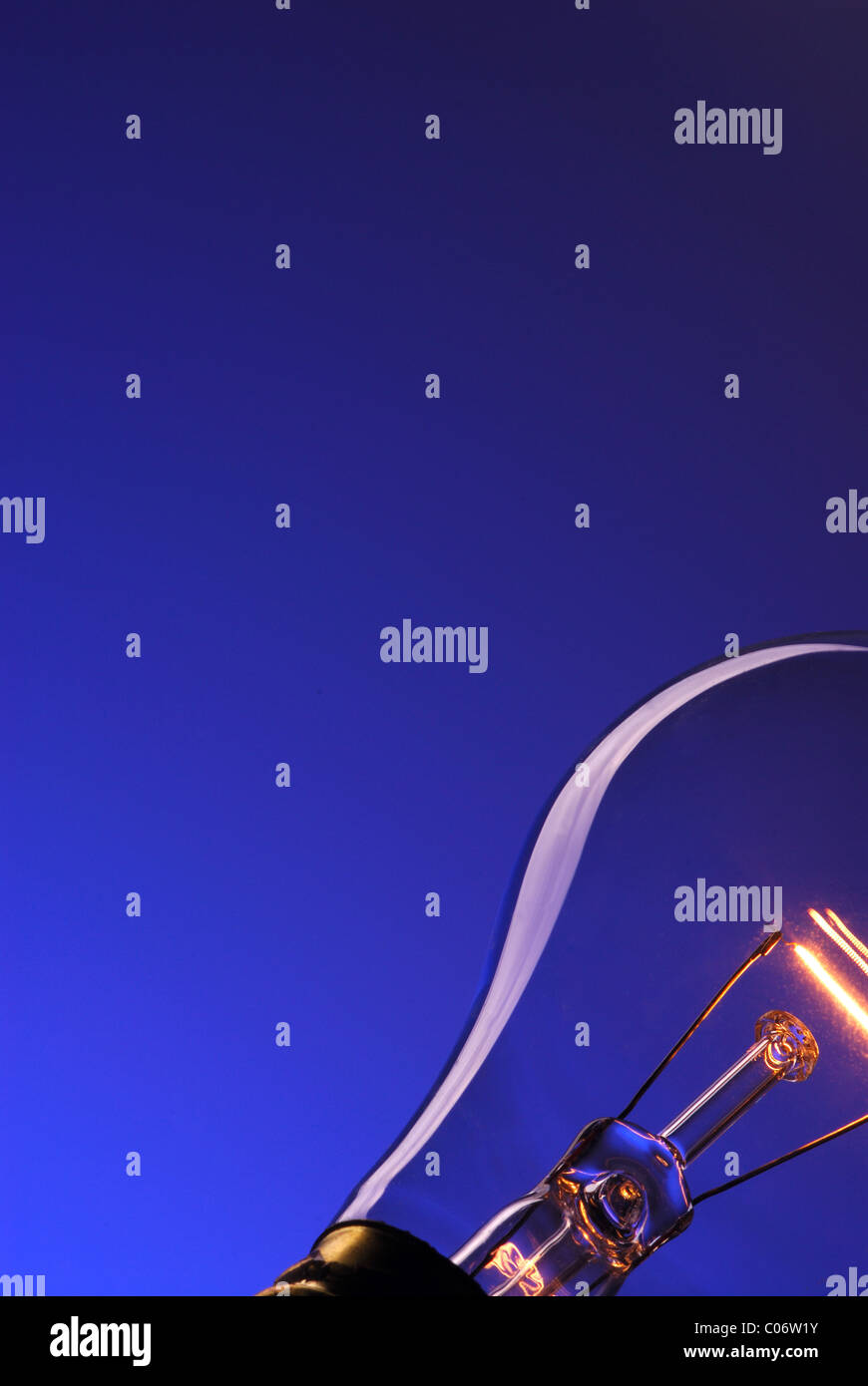 A lightbulb on a blue background with a lot of space for copy Stock ...