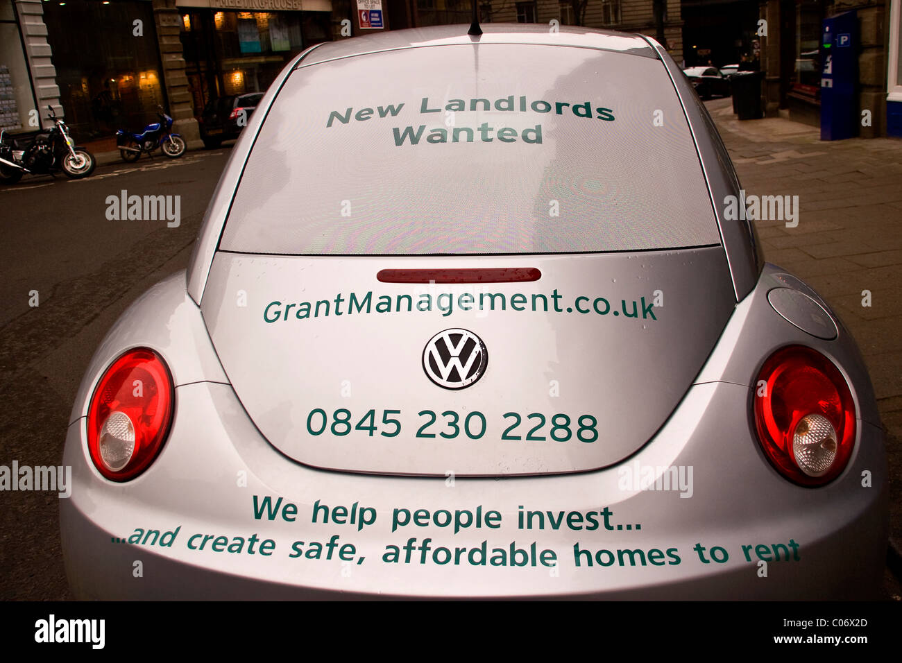 Rear view of VW Beetle advertising jobs for new landlords wanted to promote affordable housing to rent in Dundee,UK Stock Photo