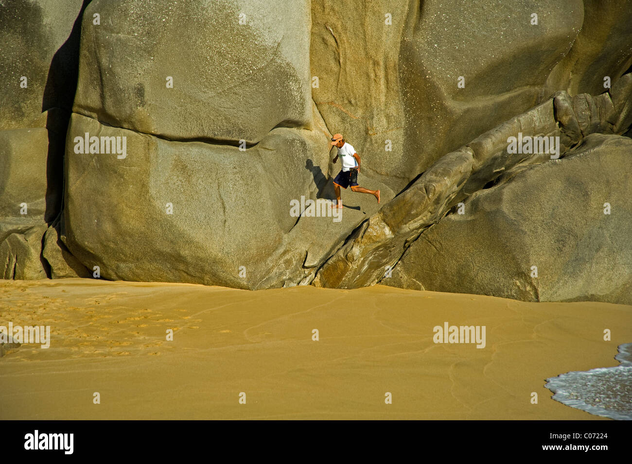 Guy Running Down Red Rocks Backwards Stone pass hi-res stock photography and images - Alamy