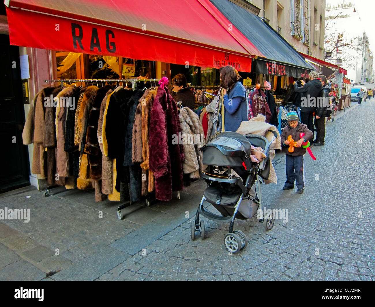 Paris, France, Woman Shopping, French Vintage Clothing Store, Display, 'Rag' thrift shop old clothing Stock Photo