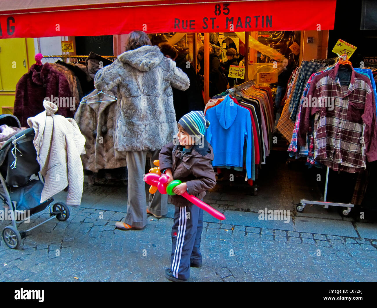 Paris, France, Family Shopping, French Vintage Clothing Store, Display, 'Olympa' Parisian Street Scene, Boy and Mum Stock Photo