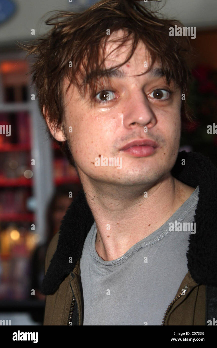 Pete Doherty and girlfriend Irina Lazareanu take time to visit their local pub, the Sun Inn, and a fun fair which had been set Stock Photo