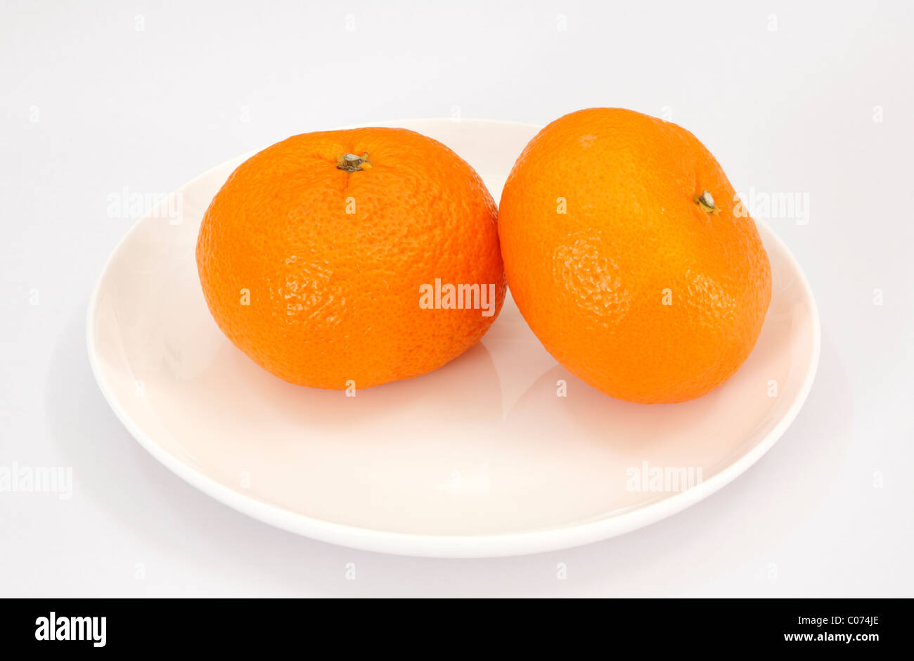 Close-up of Japanese orange colored tangerines. Stock Photo