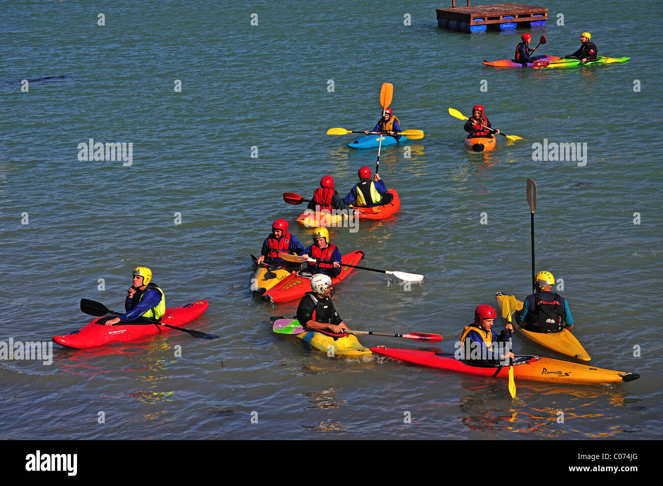 Teenage school group on kayaking course, Cass Bay, Lyttelton Harbour ...