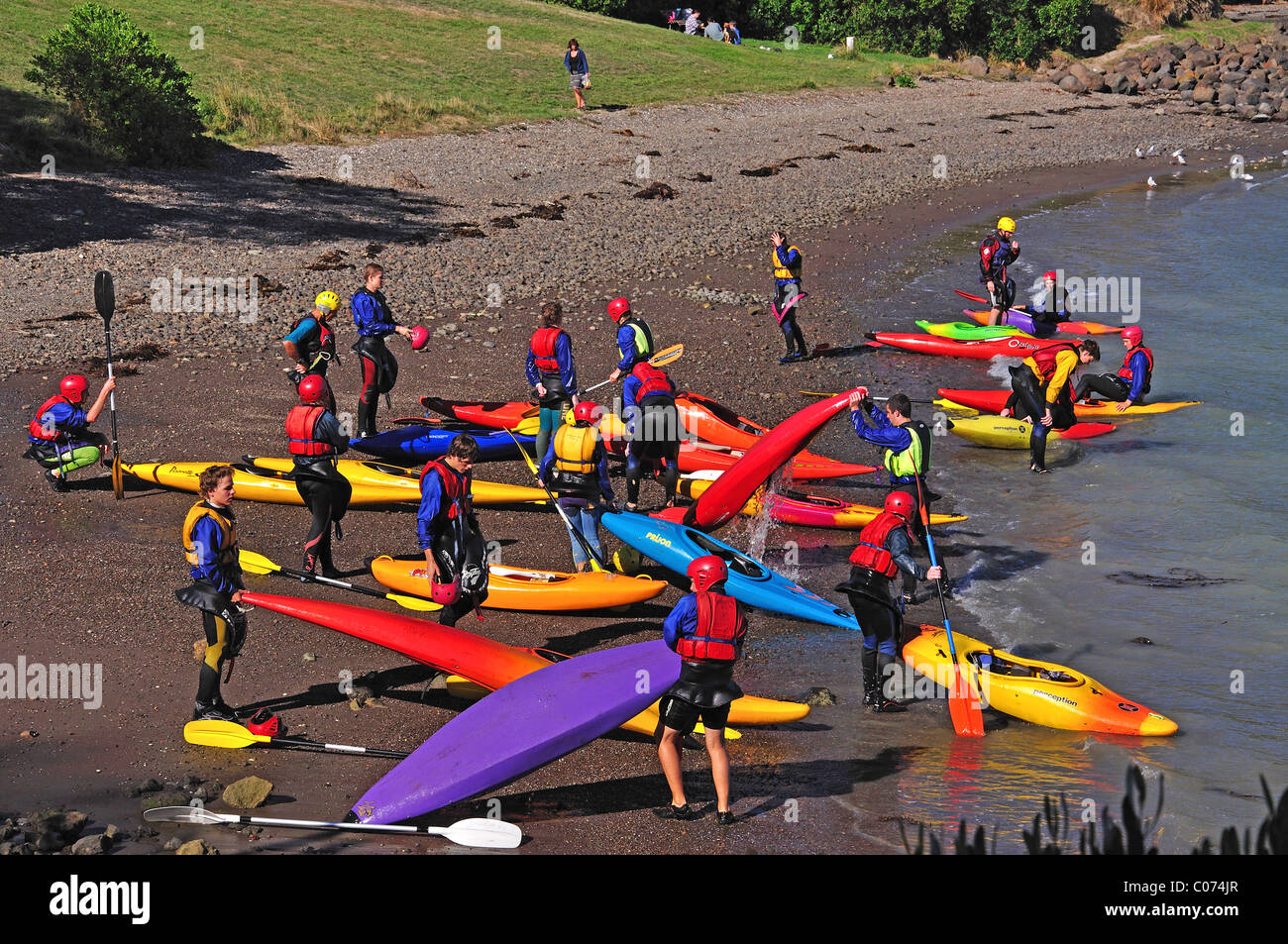 Teenage school group on kayaking course, Cass Bay, Lyttelton Harbour ...