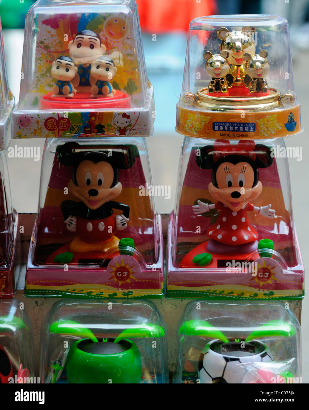 childrens toys mickey minnie mouse disney characters petaling street market chinatown kuala lumpur malaysia Stock Photo