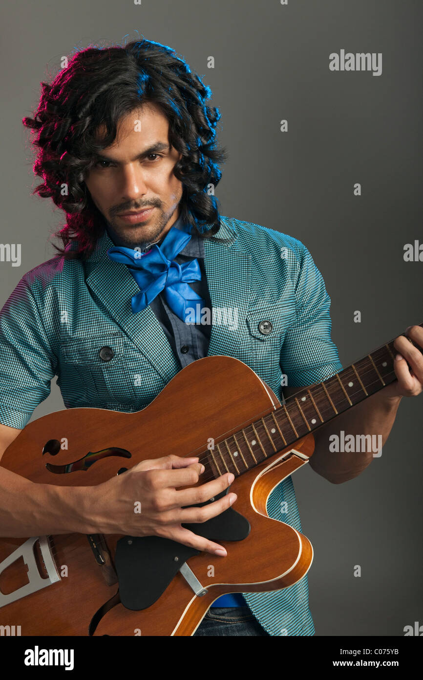 Person guitarist hairstyle human hi-res stock photography and images - Alamy