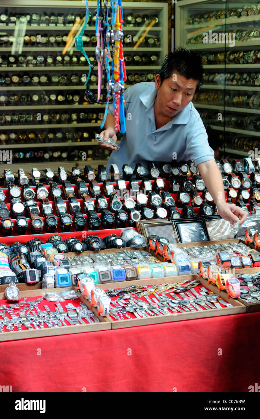 fake designer pirate pirated luxury goods on sale stall petaling street  chinatown kuala lumpur malaysia louis vuitton bags Stock Photo - Alamy