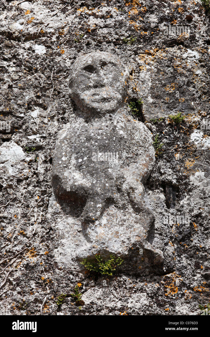 Sheela-na-Gig on the church wall of Killinaboy, Burren, County Clare, Ireland, Europe Stock Photo