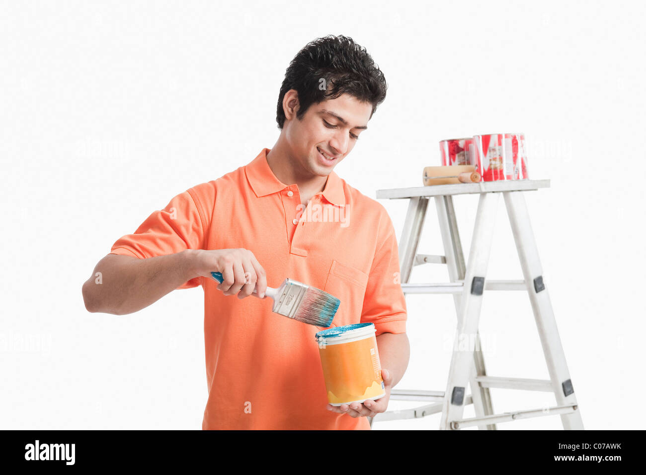 Indian man holding can hi-res stock photography and images - Alamy