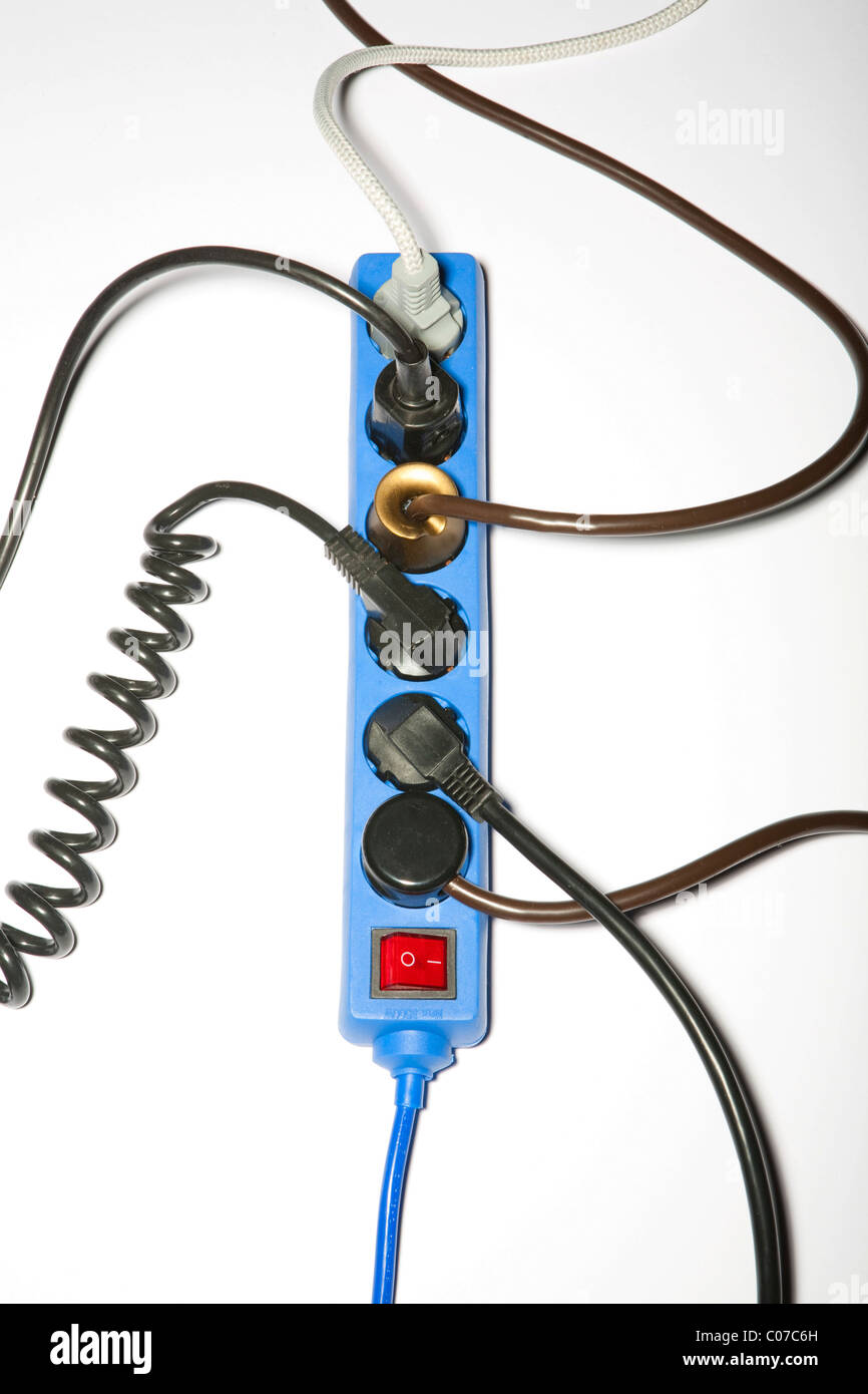 Multiplug power strip with plugs and cables Stock Photo Alamy