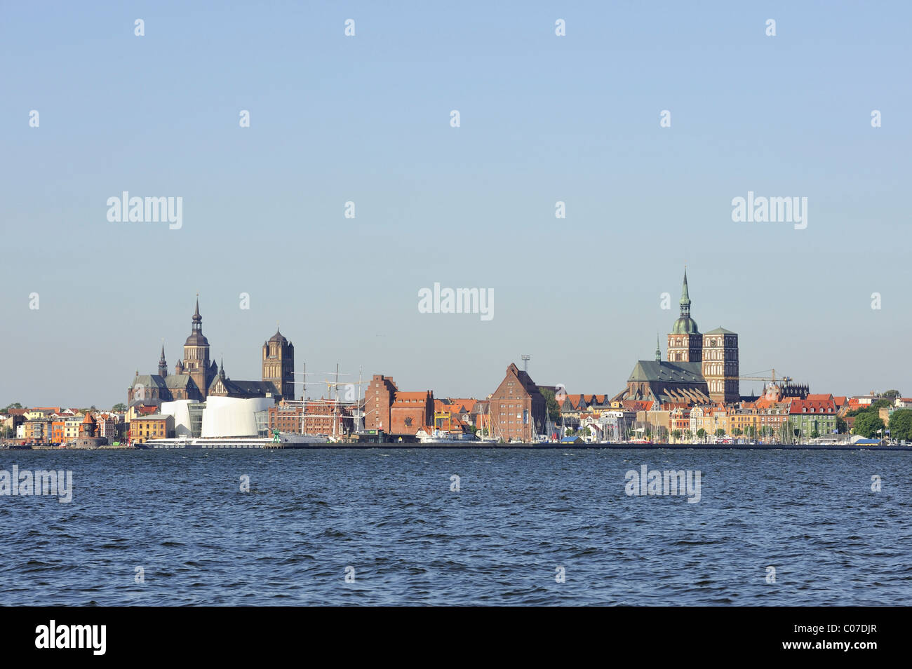 View from Ruegen island over the Strelasund sound on the skyline of the Hanseatic city of Stralsund Stock Photo