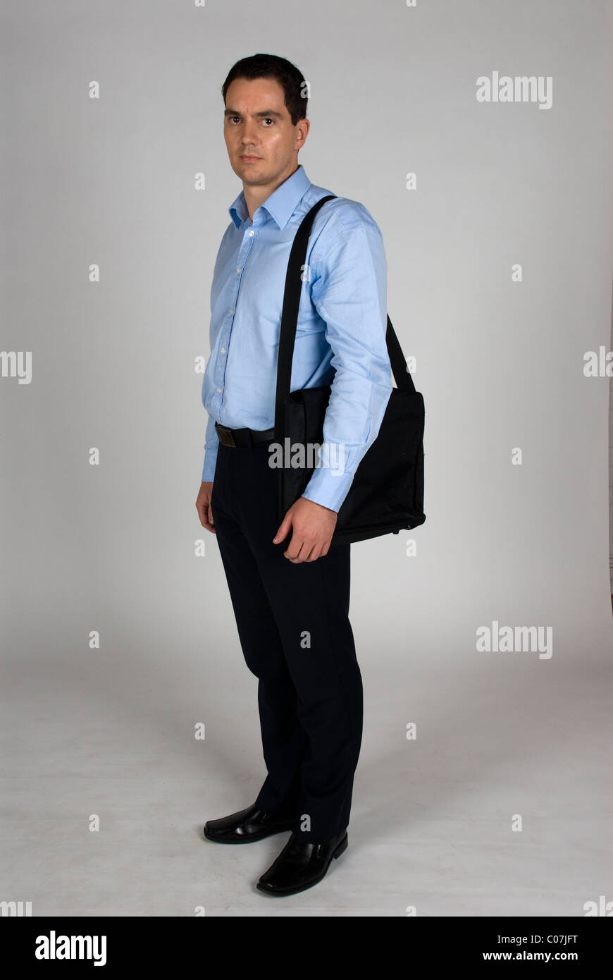 man with laptop bag
