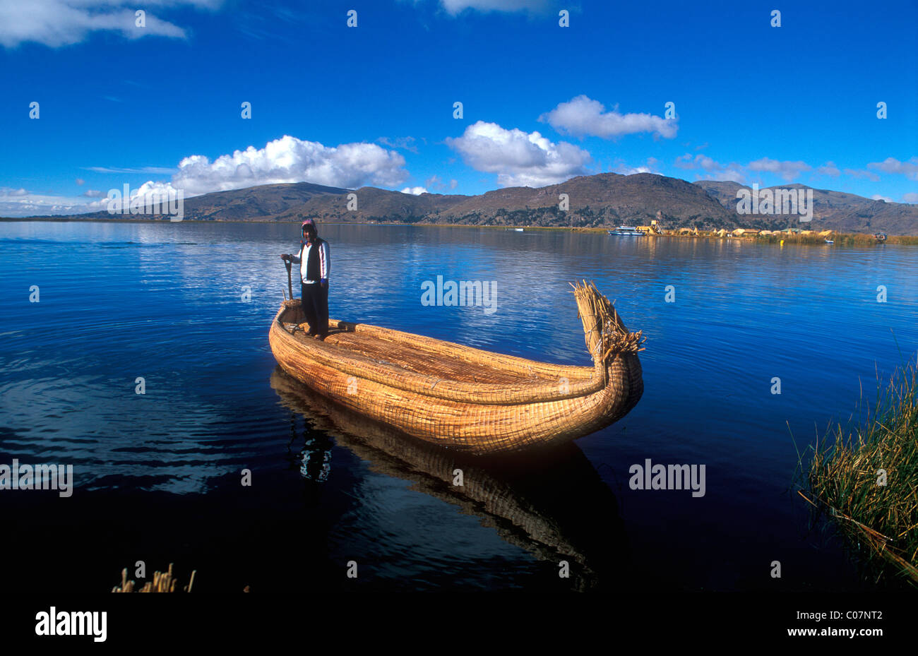 Aymara indigenous people on a reed boat made from Totora-reeds, Lake ...