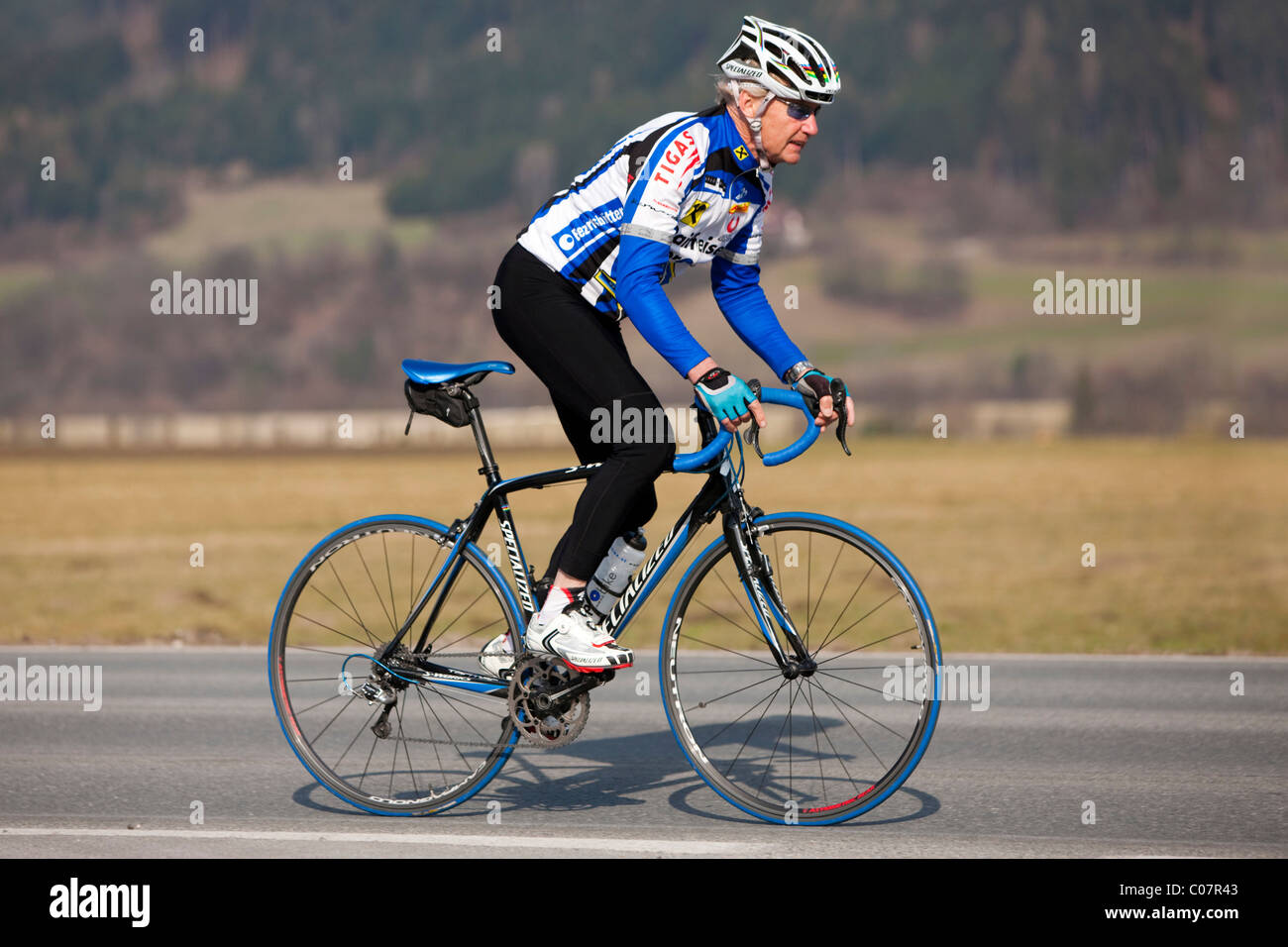 Agile senior cycling, Weer, North Tyrol, Austria, Europe Stock Photo