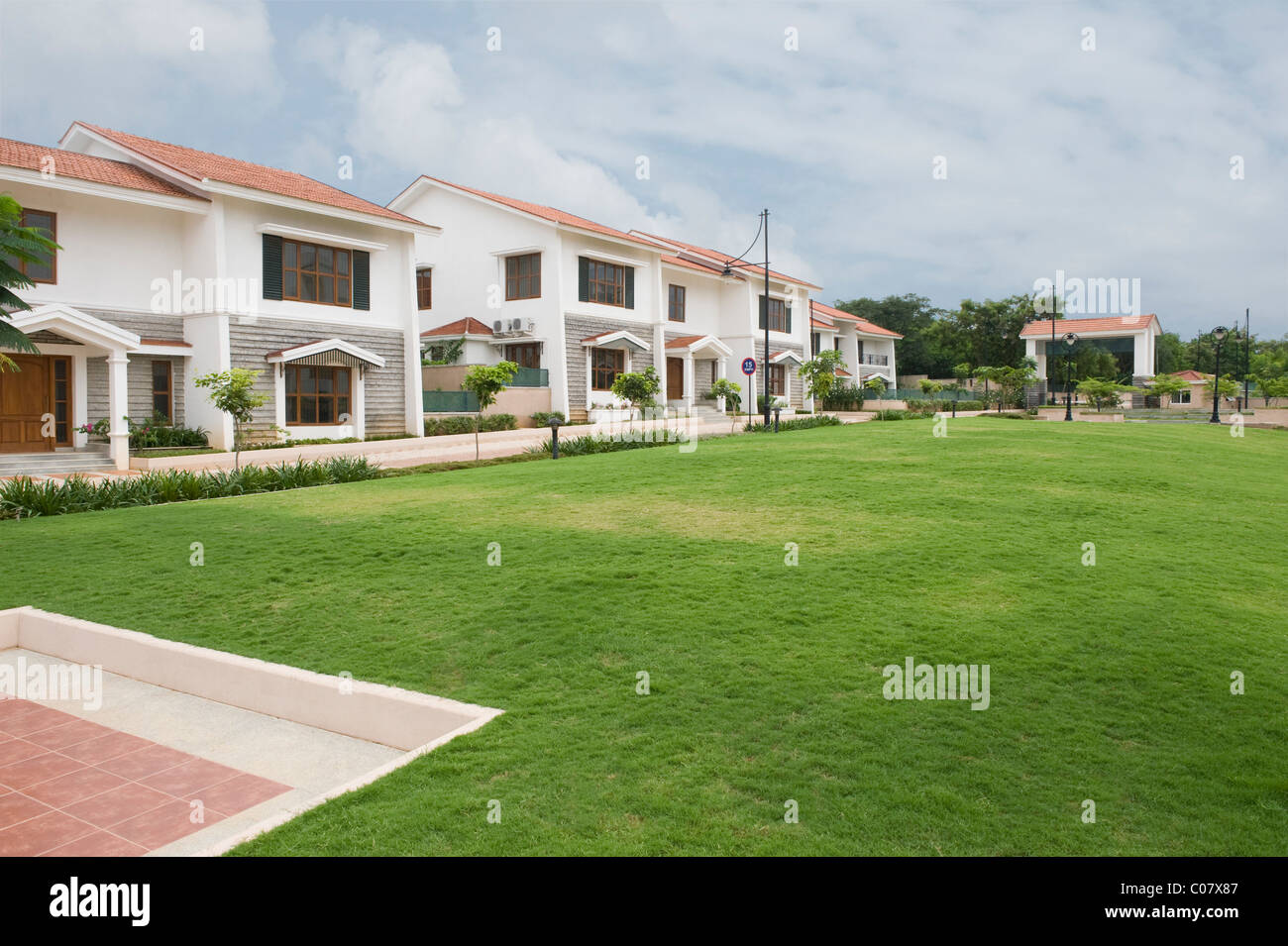 Lawn in front of bungalows, Bangalore, Karnataka, India Stock Photo