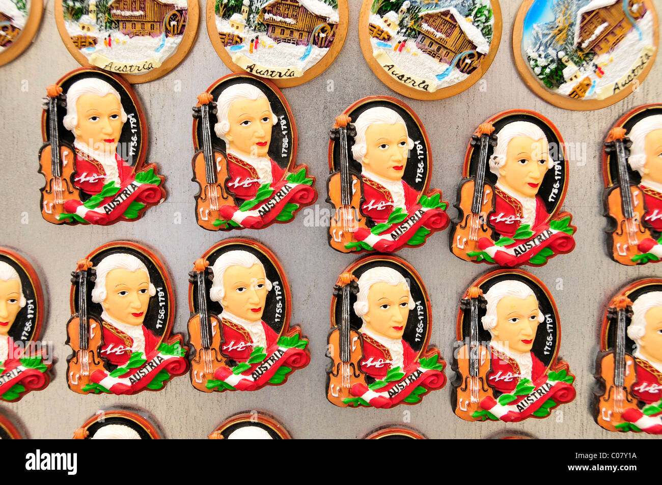 Refrigerator magnets with the image of Wolfgang Amadeus Mozart at a kiosk in the historic town centre of Salzburg, Salzburg Stock Photo