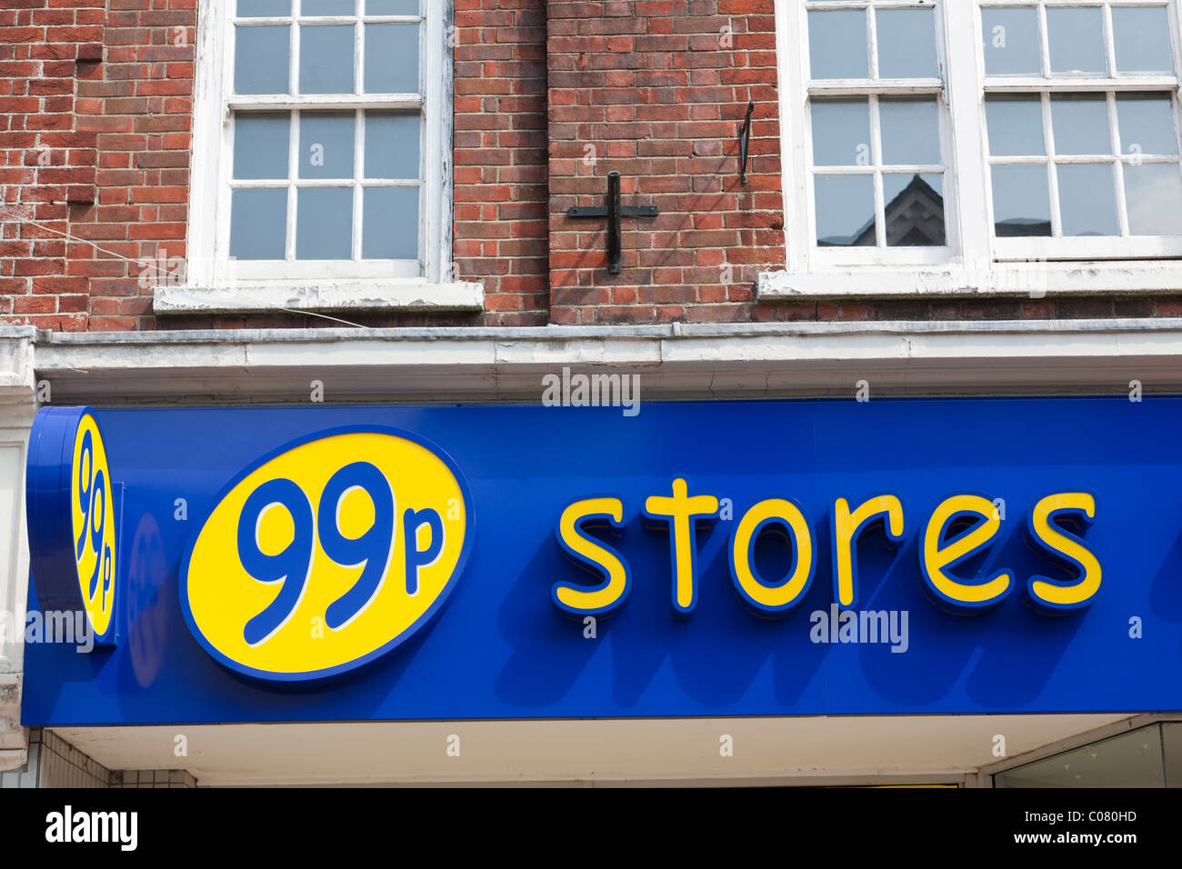 Signage of a 99p discount store. Stock Photo