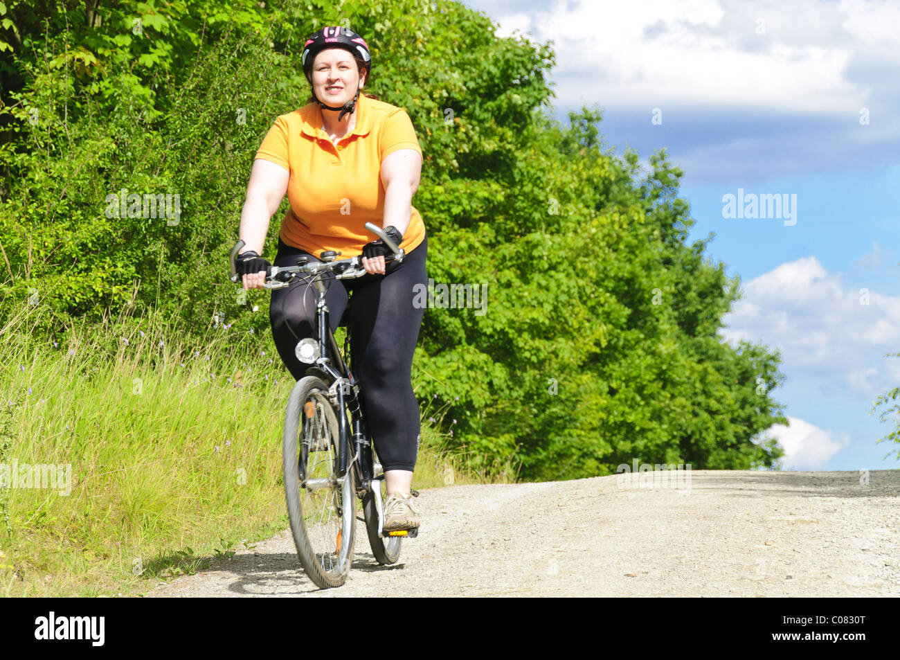XL model, overweight women cycling Stock Photo Alamy
