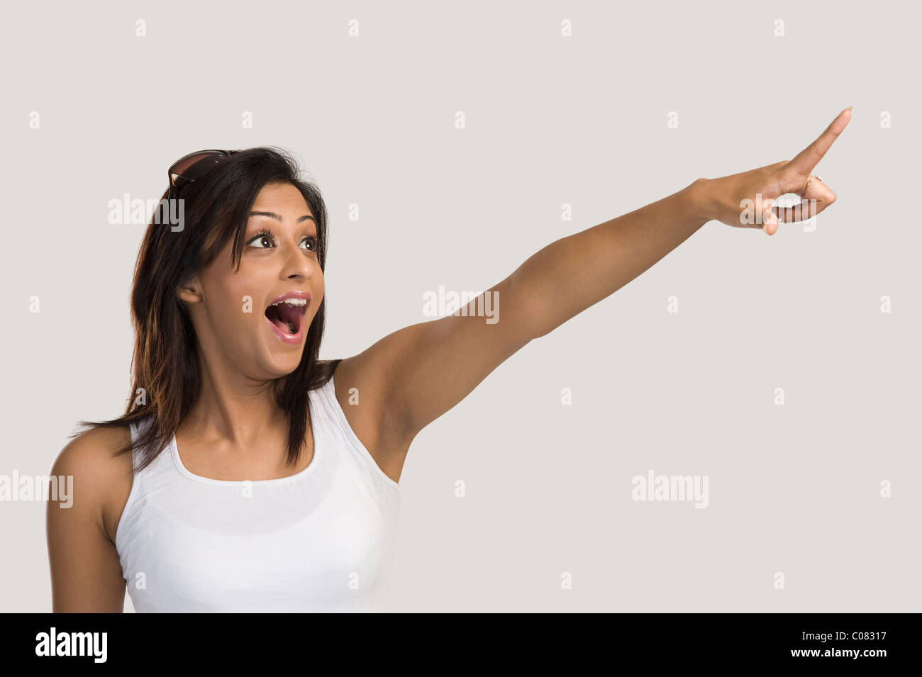 Woman pointing finger hi-res stock photography and images - Alamy
