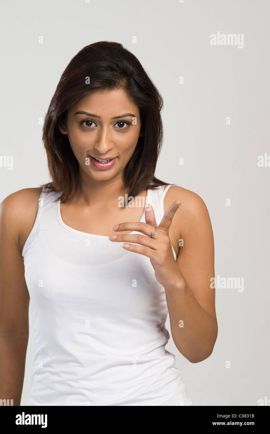 Indian young woman finger pointing hi-res stock photography and images ...