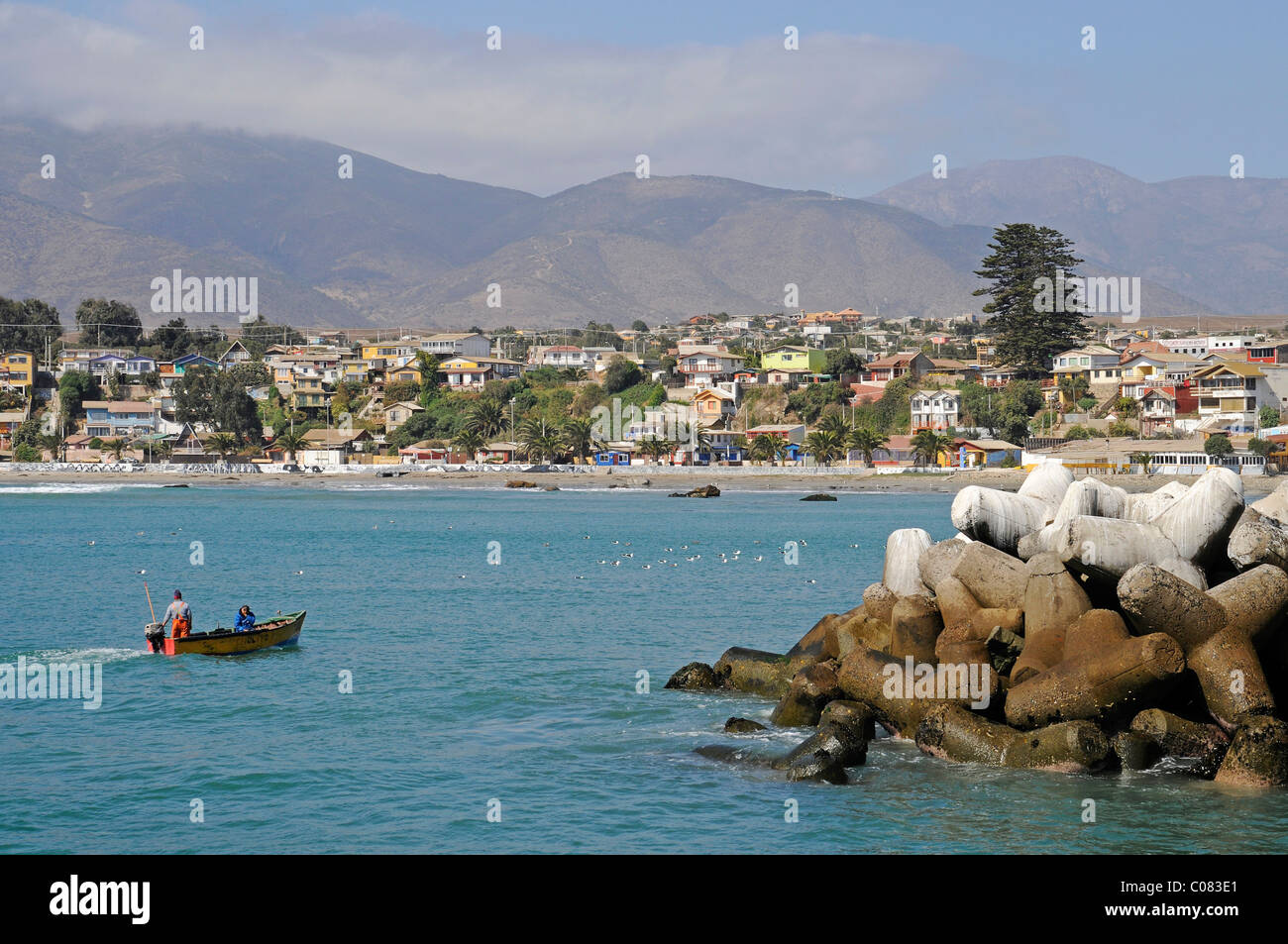 Small fishing boat, breakwater, harbor, sea, coast, Los Vilos, Pichidangui, small seaside resort, Norte Chico, northern Chile Stock Photo