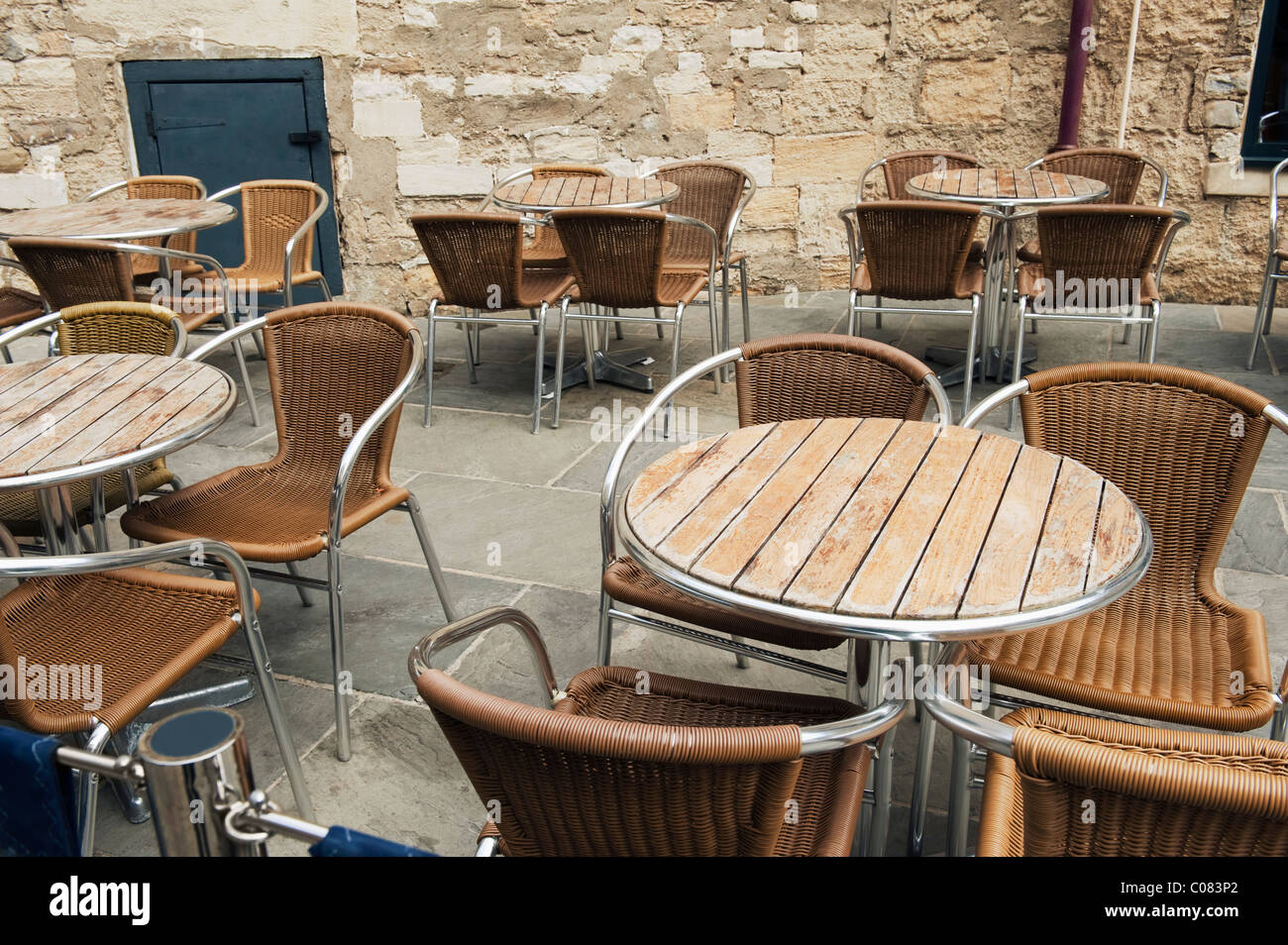Tables and chairs at an outdoor cafe, Oxford, Oxfordshire, England Stock Photo