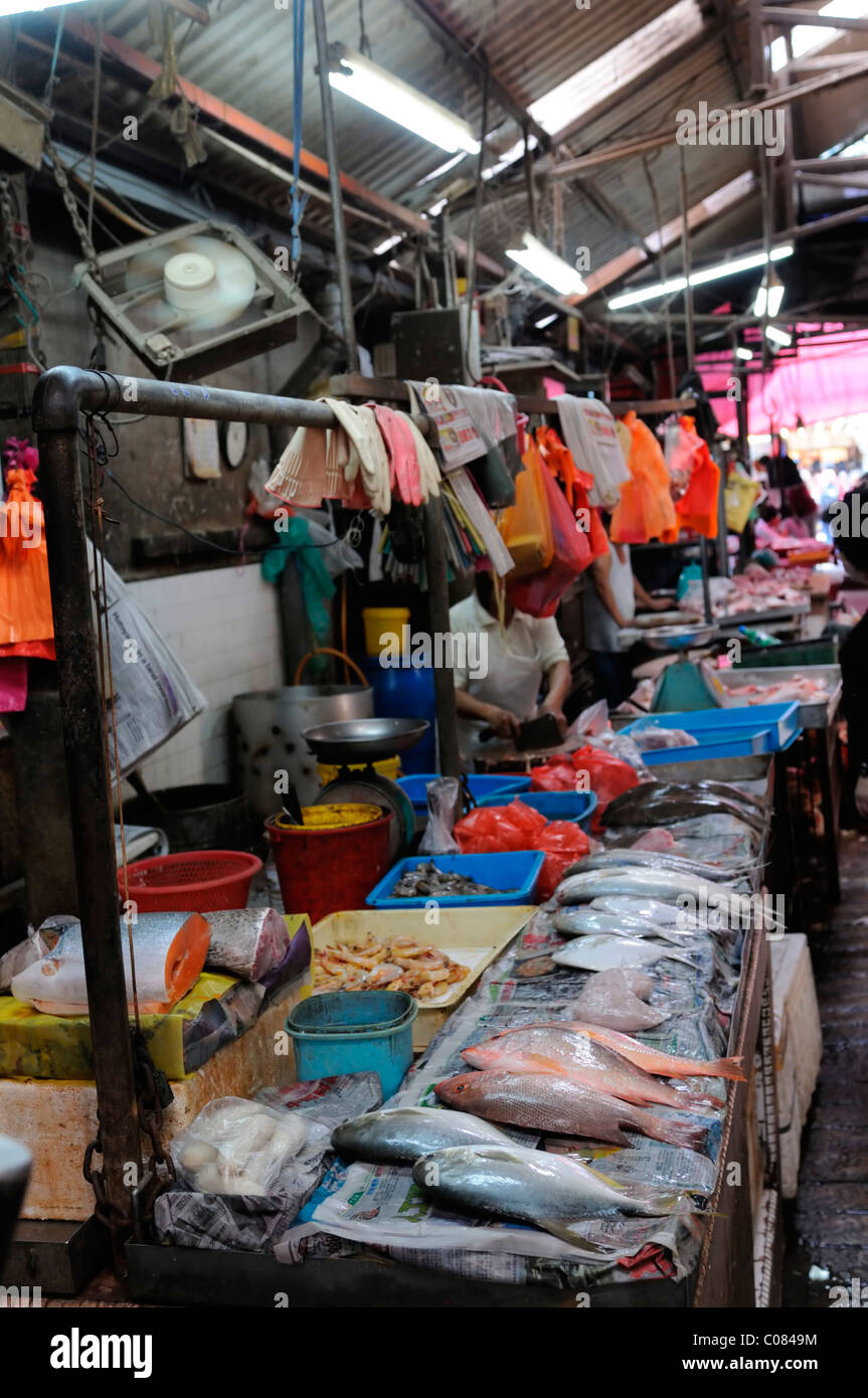 fresh whole fish on sale in the crowded wet market petaling street kuala lumpur chinatown malaysia malaysian chinese Stock Photo