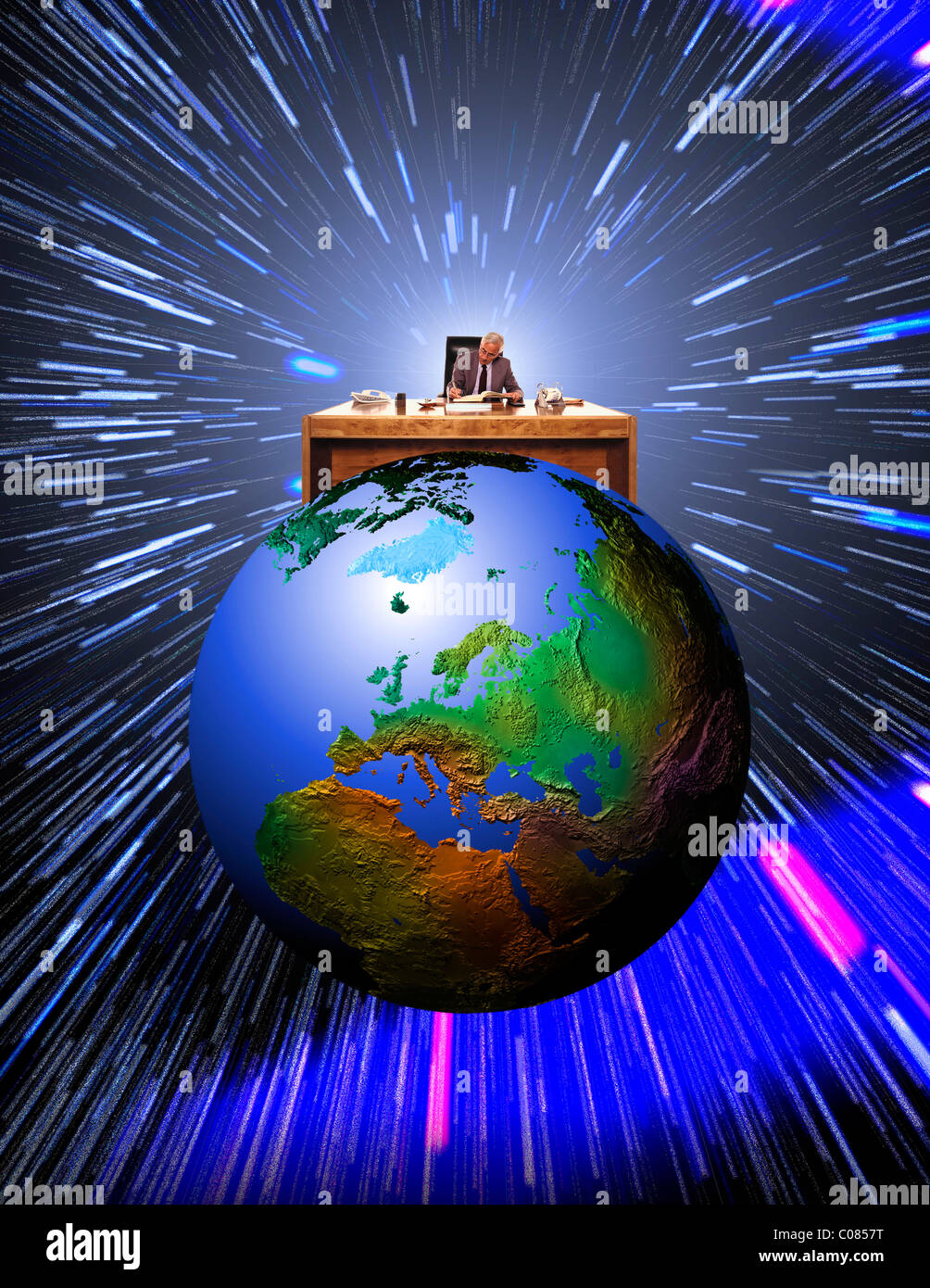 Business man on top of the world (showing Europe) Stock Photo