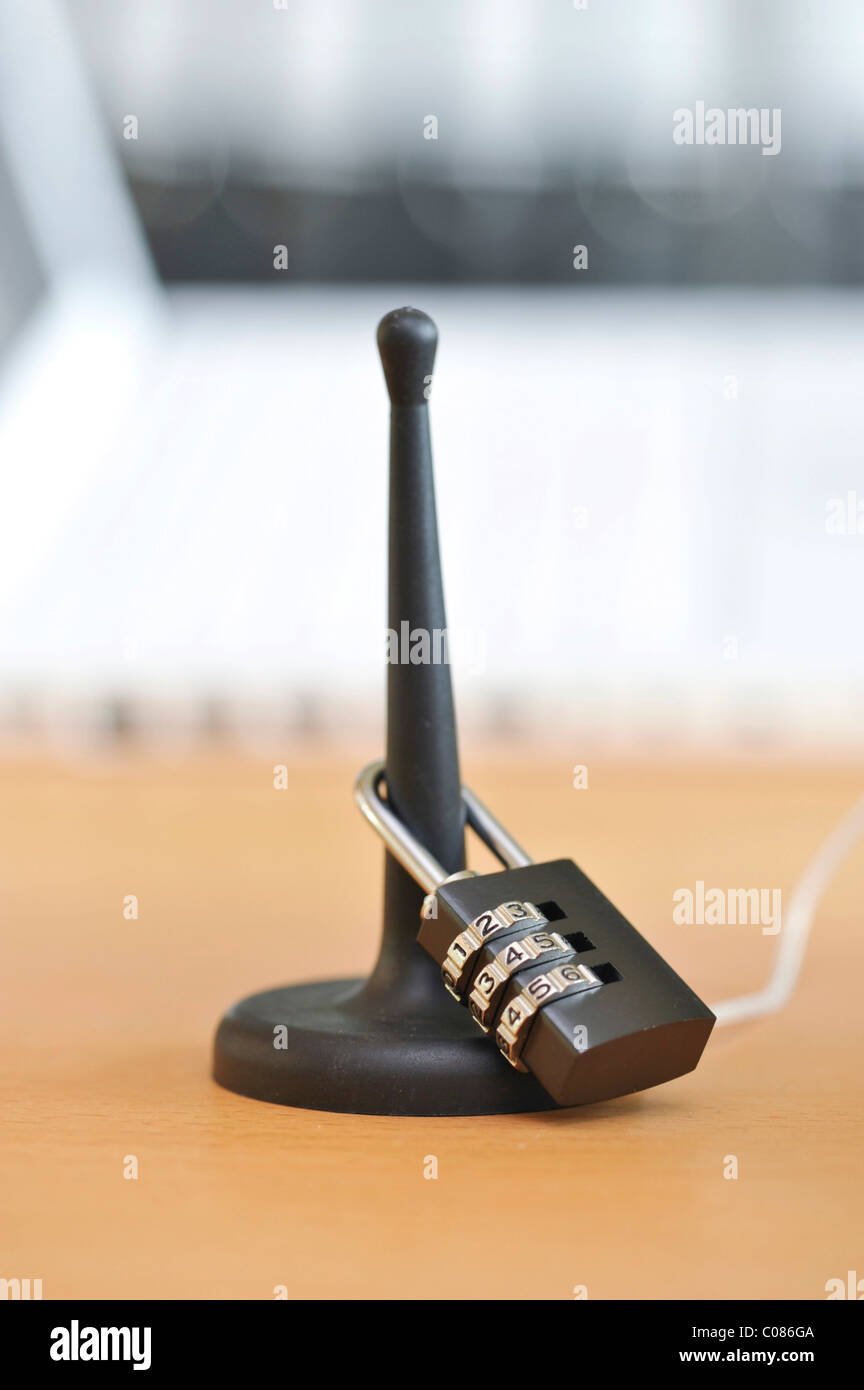 W-LAN antenna with combination lock, symbolic image, secured wireless Wi-Fi networks Stock Photo