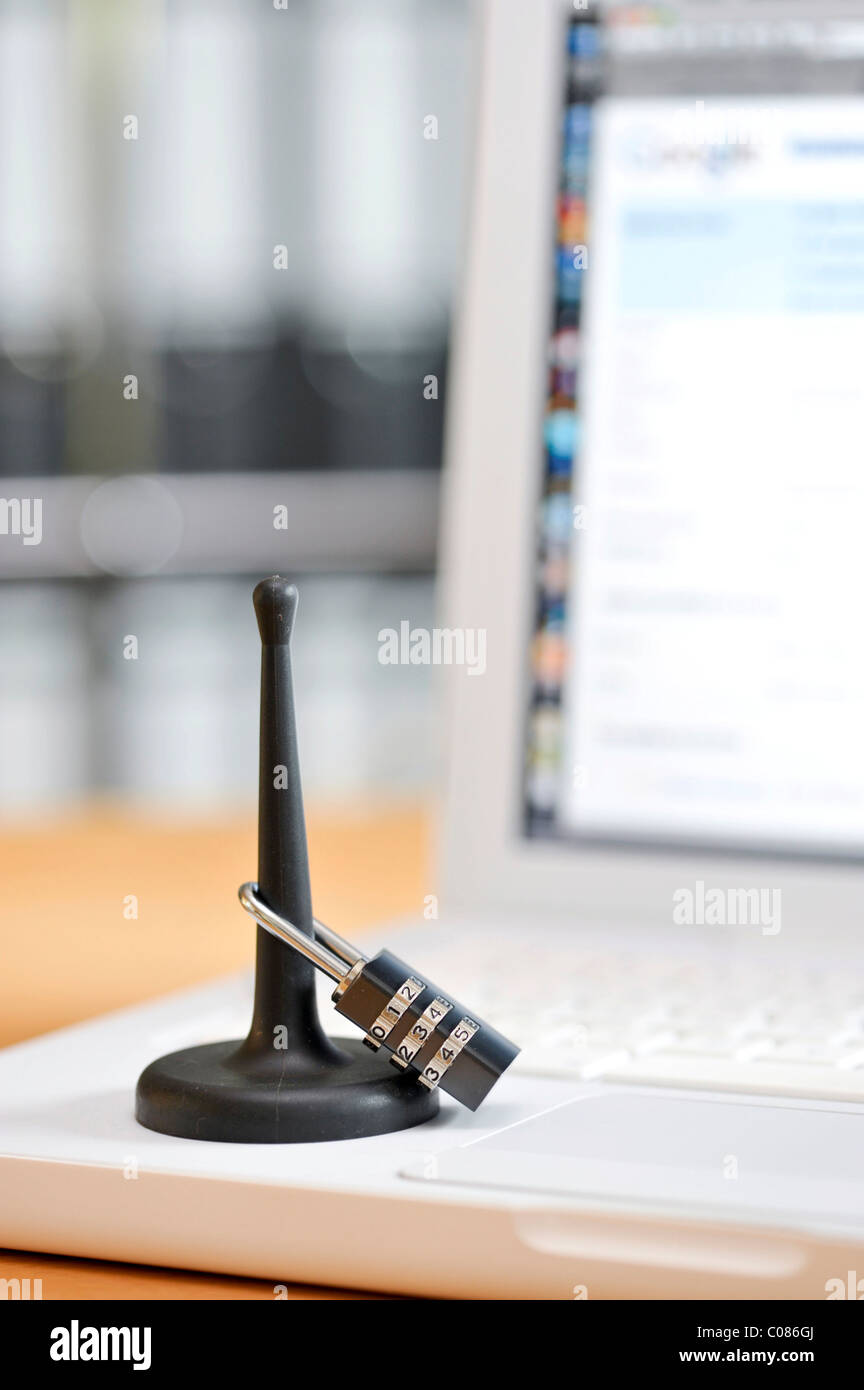 W-LAN antenna with combination lock, symbolic image, secured wireless Wi-Fi networks Stock Photo
