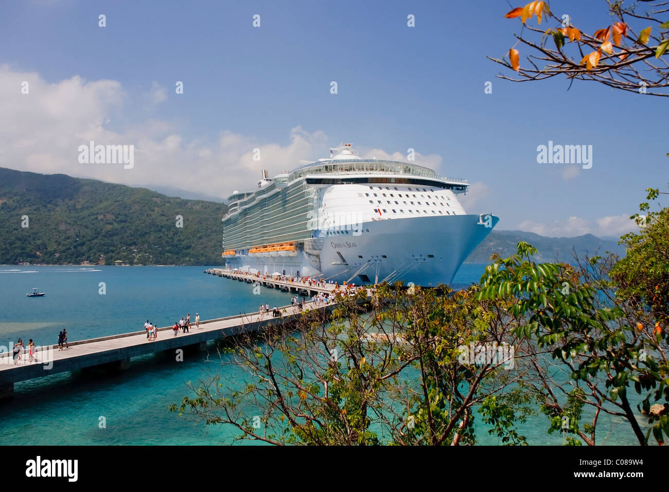 A huge luxury cruise ship at a tropical port Stock Photo