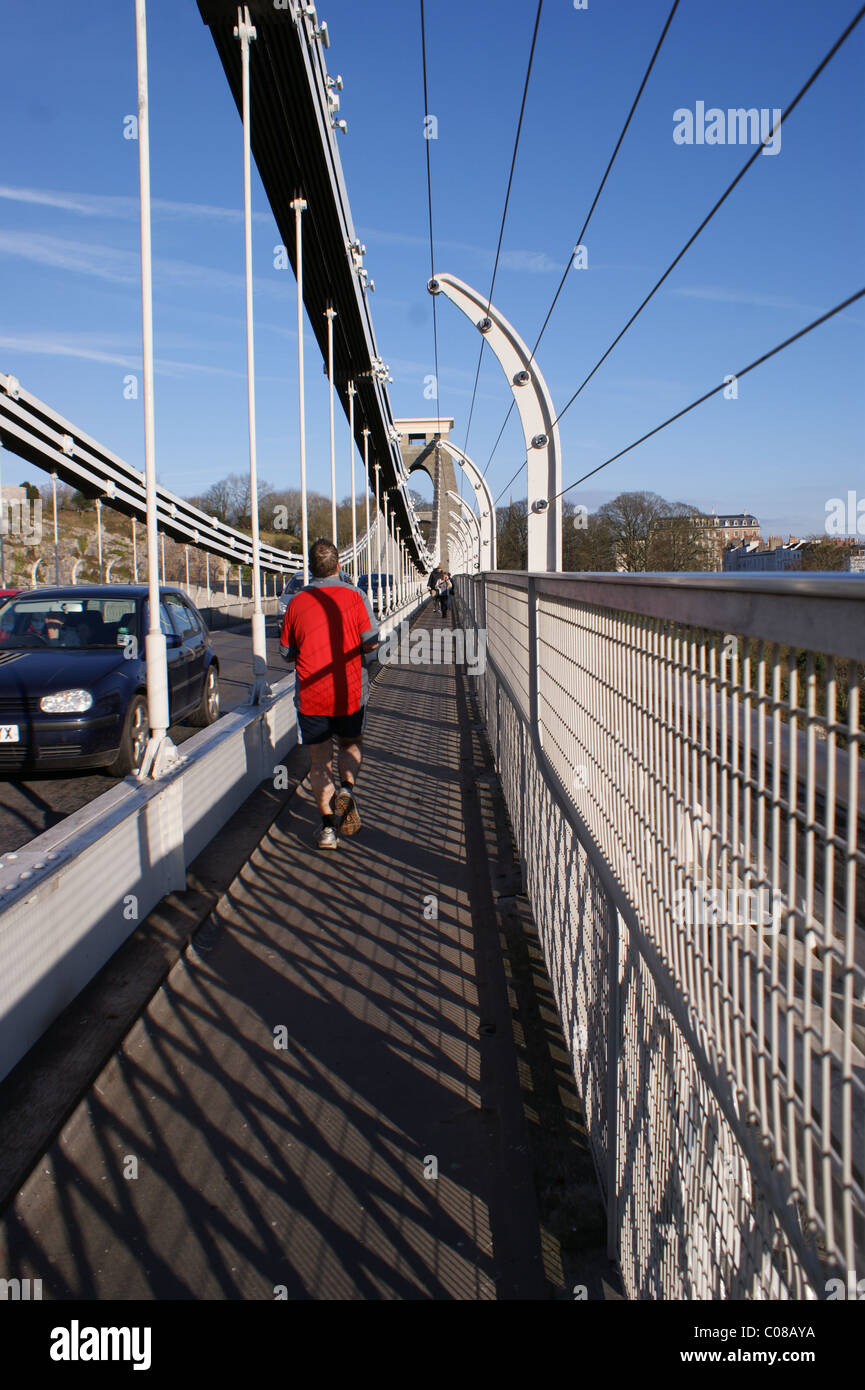 Man on suspension bridge hi-res stock photography and images - Alamy