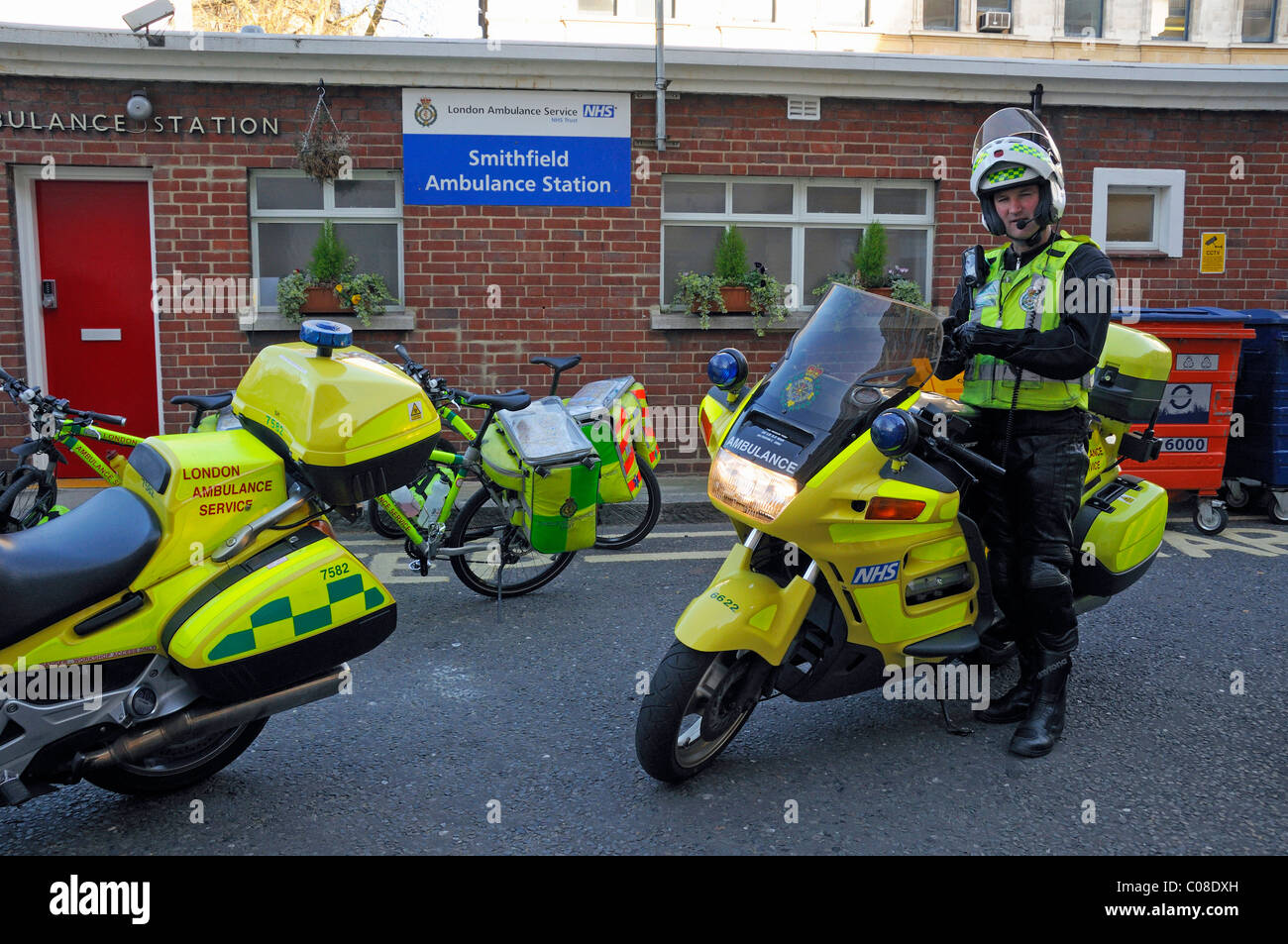 Paramedic motorcyclist outside Smithfield Ambulance Station City of London England UK Stock Photo