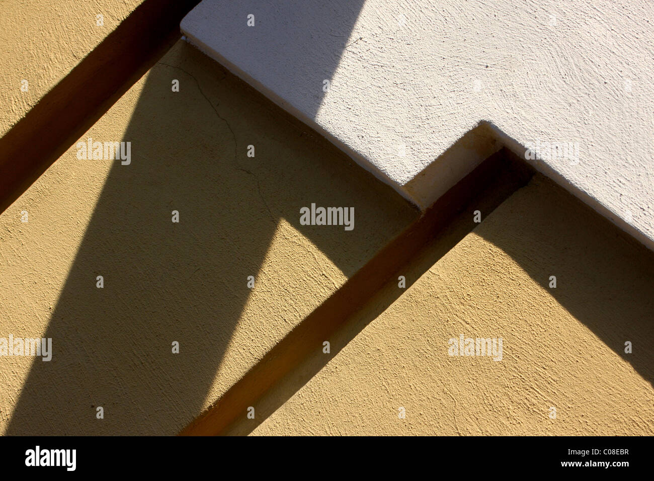 Yellow and white concrete texture with a shadow Stock Photo