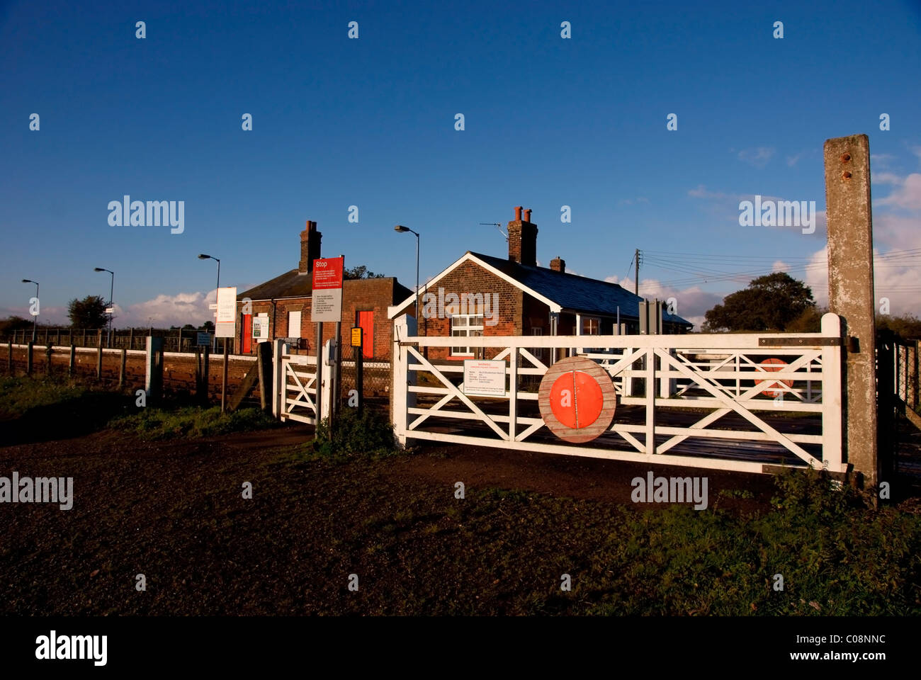 The self service level crossing at Buckenham railway station  on the Norwich-Lowestoft/Great Yarmouth Wherry Line Stock Photo