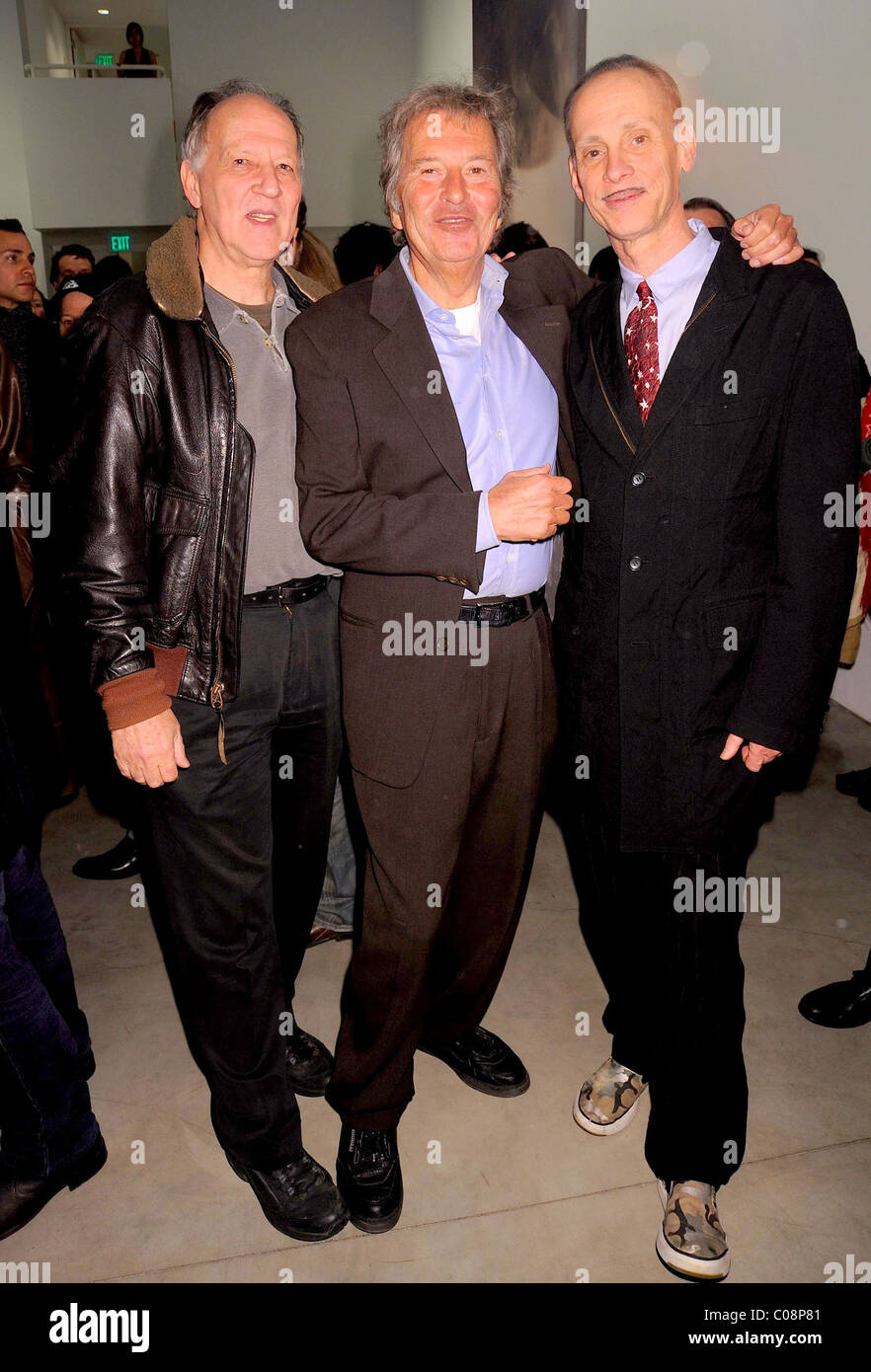 l-r) Werner Herzog, Gilles Bensimon and John Waters Gagosian Gallery  opening reception for Julian Schnabel's exhibition of Stock Photo - Alamy