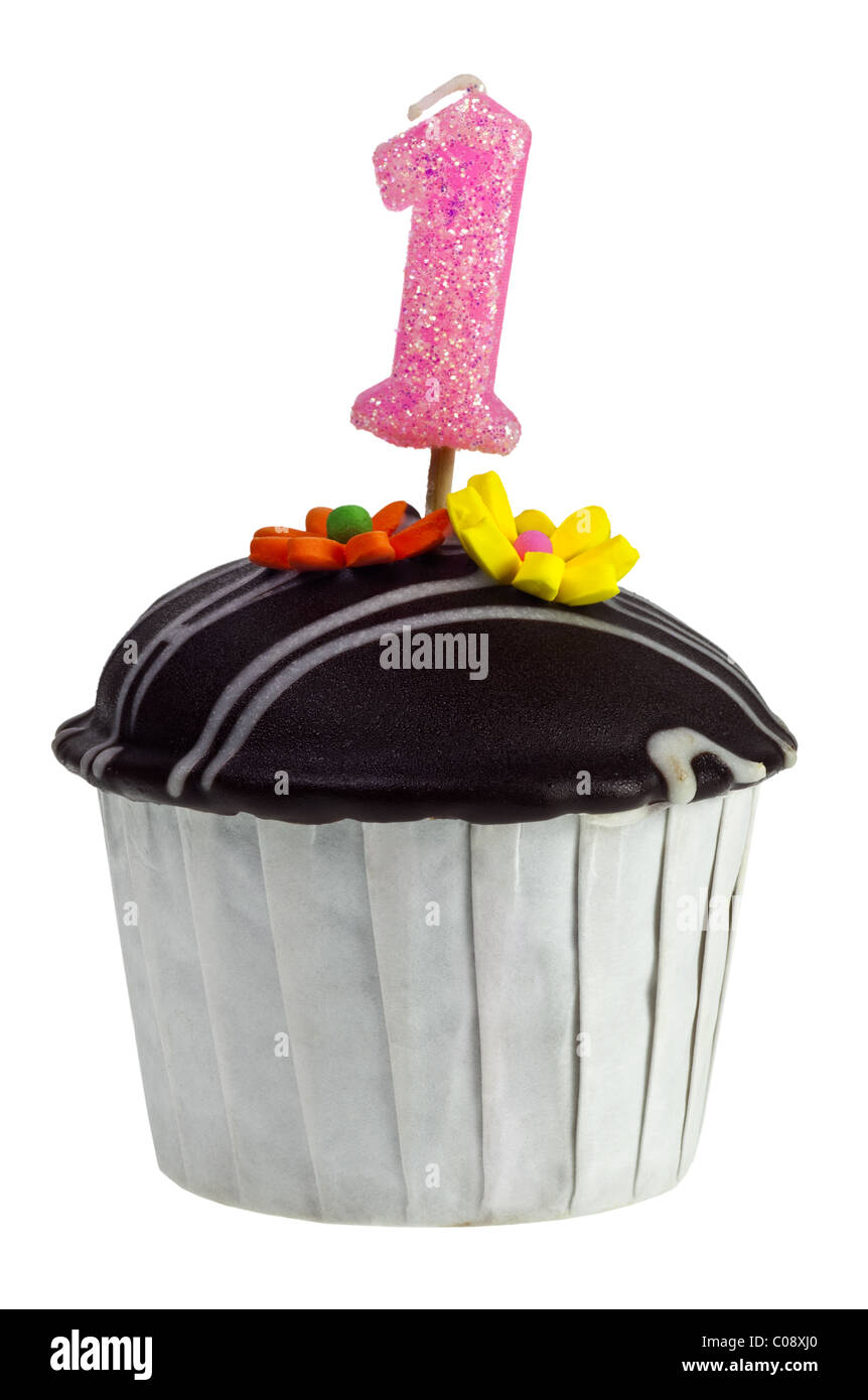 Cupcake with birthday candle for one year old isolated on white
