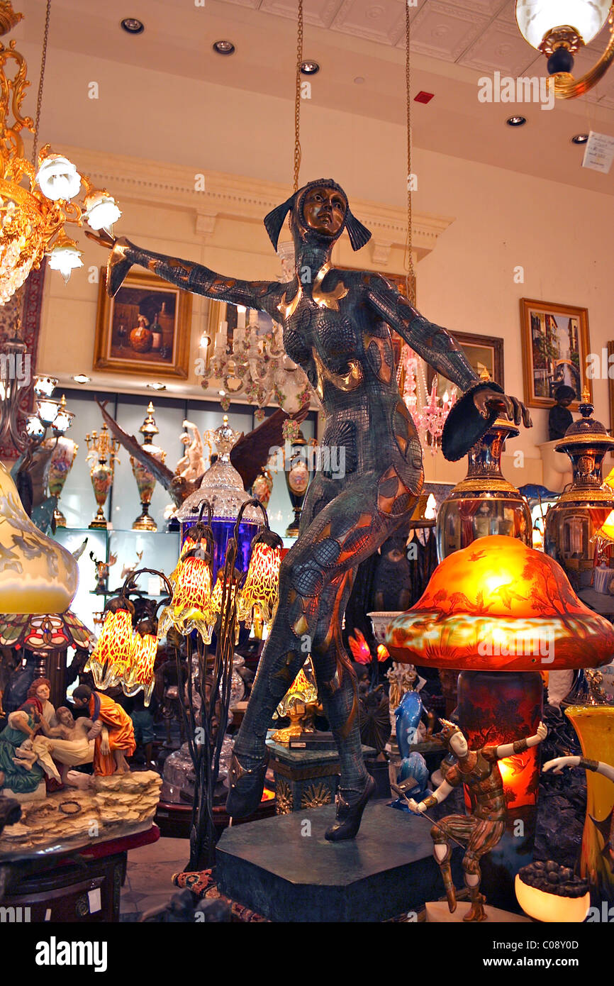 A metal statue of a dancer at a store inside the Paris Las Vegas Hotel