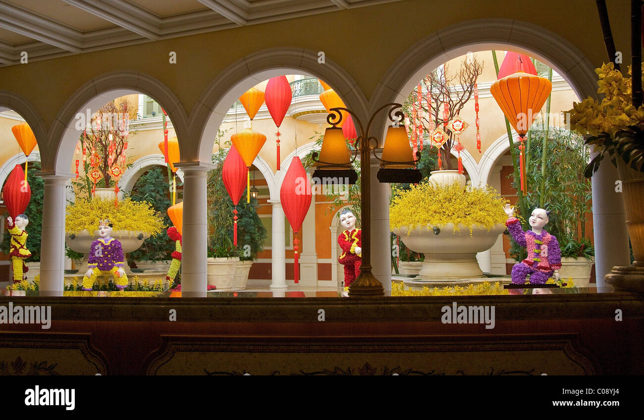 Looking from the lobby towards the Chinese New Year display at the Bellagio Conservatory and Botanical Gardens in Las Vegas Stock Photo